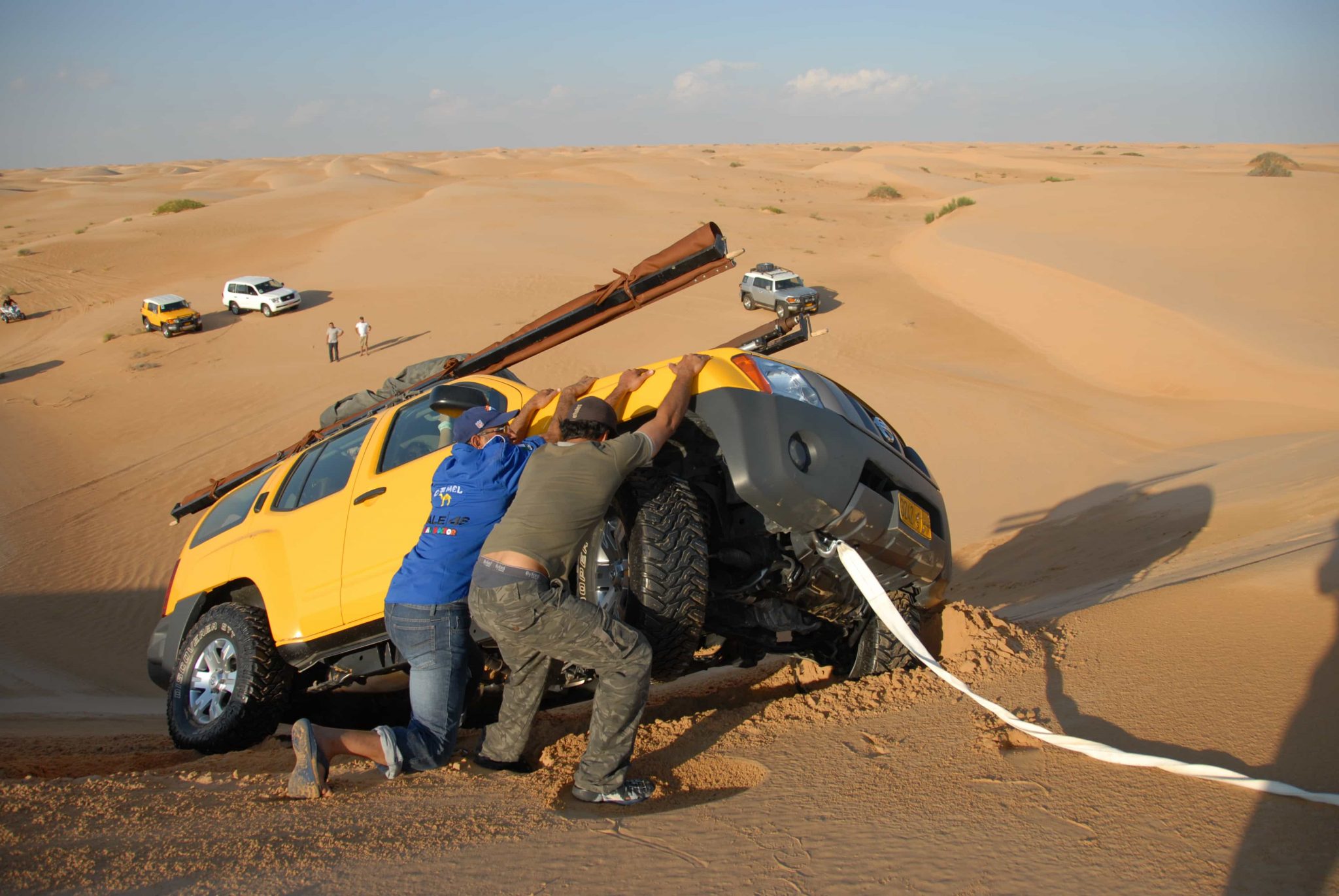 Helping hands preventing car from flipping