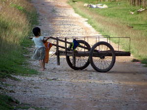 Girl pushing cart, Travel Alone as a Woman